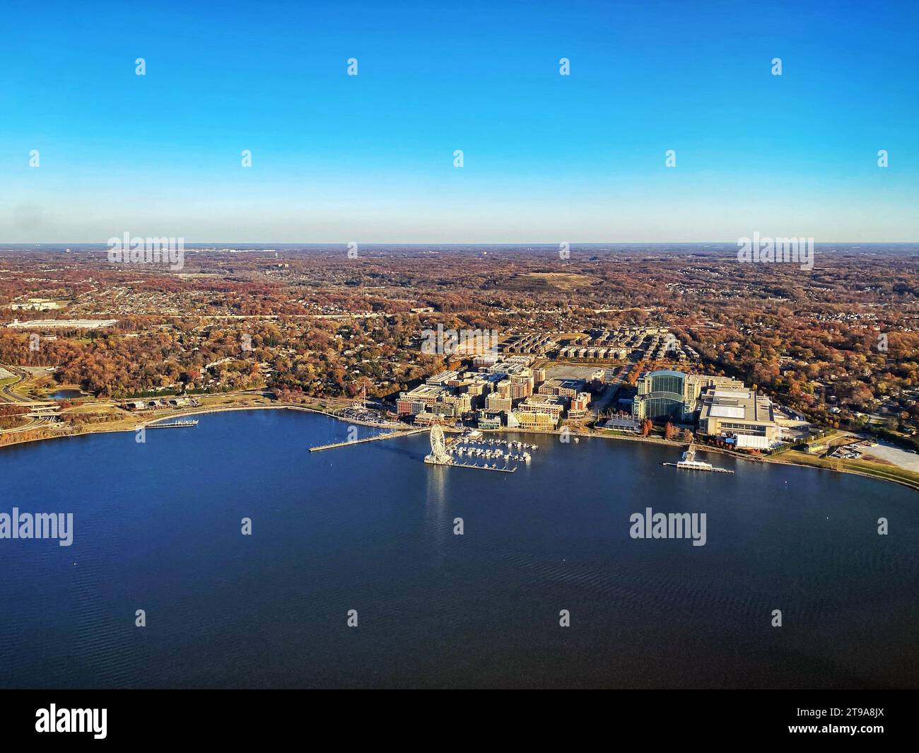 Aerial view of National Harbor, Maryland, outside Washington DC, with the Capital Wheel Ferris wheel on the Potomac River near Woodrow Wilson Bridge Stock Photo
