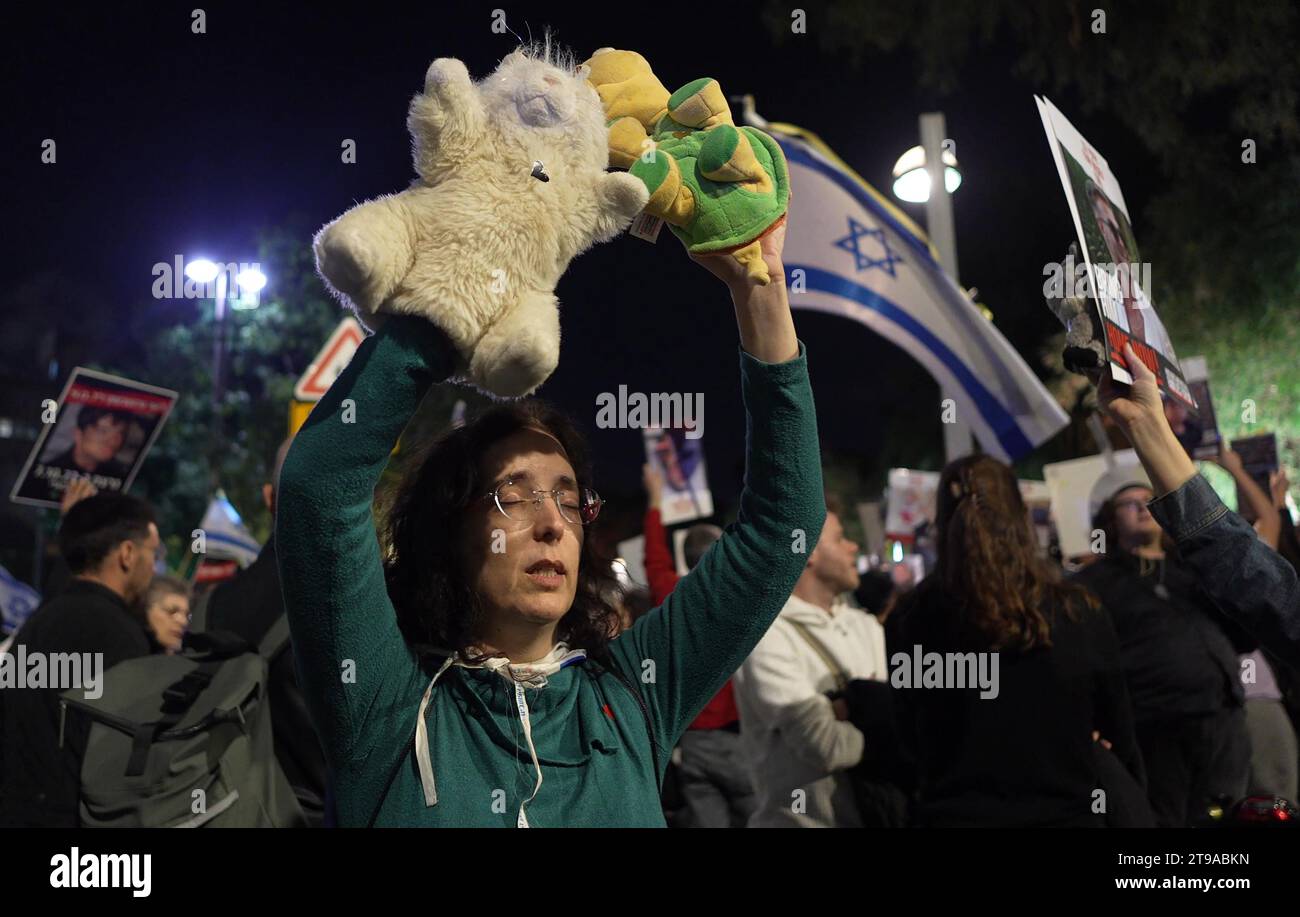 People take part in a demonstration outside the UNICEF offices to protest their silence of Israeli children held hostage in Gaza on World’s Children Day on November 20, 2023 in Tel Aviv, Israel. Stock Photo