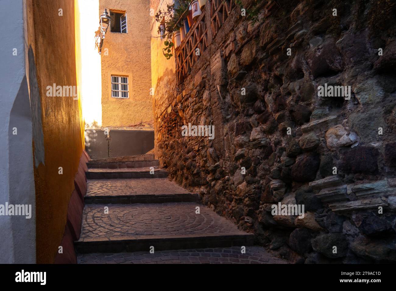 A Discover the charm of an ancient in Guanajuato town with historic houses, colorful streets, and timeless architecture Stock Photo