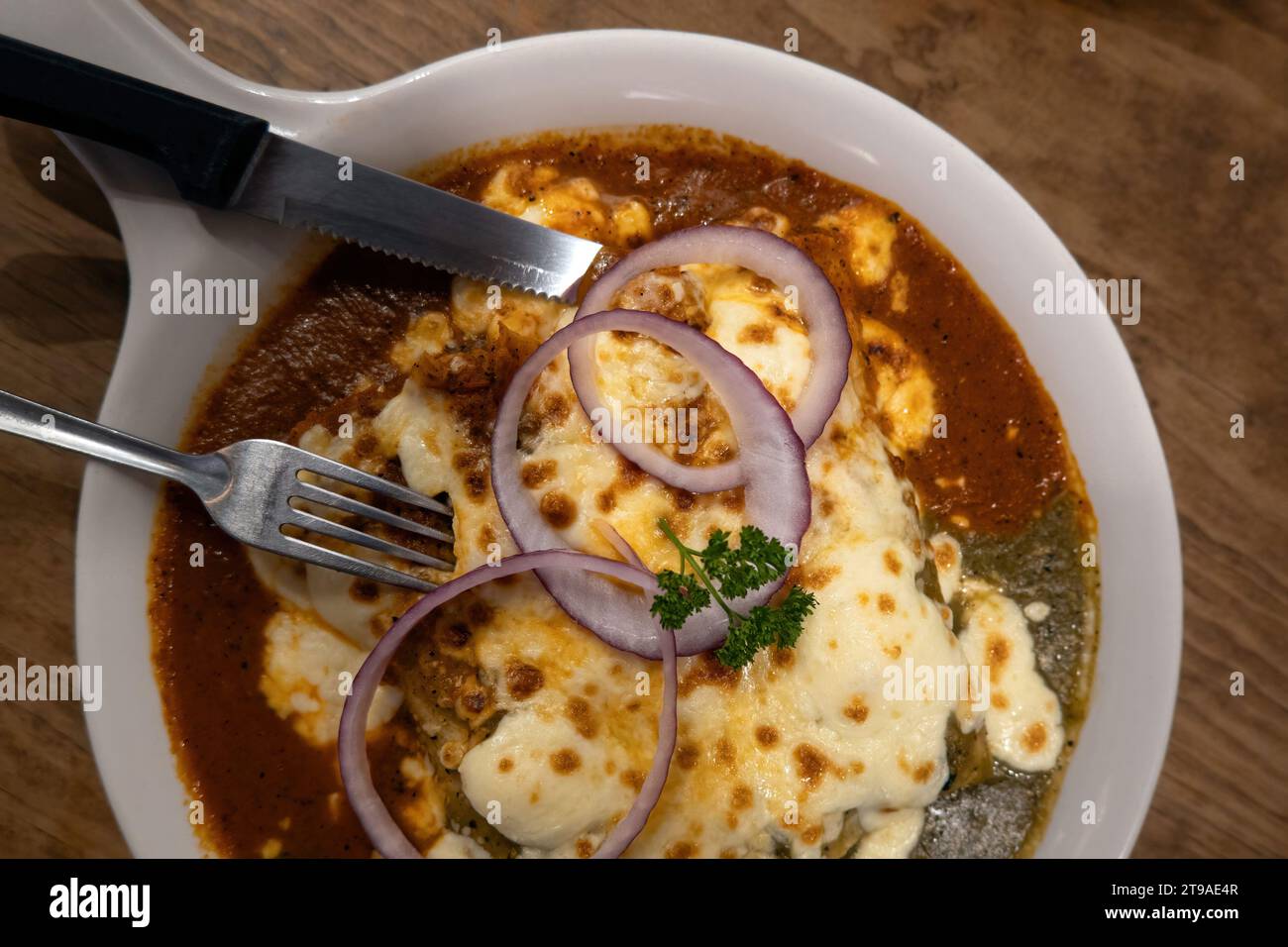 Indulge in the rich tapestry of Mexican cuisine with chilaquiles, a(06)