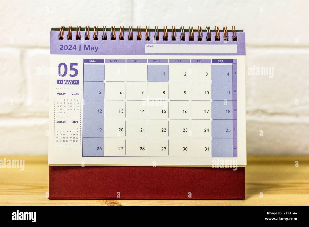 Desk calendar for May 2024 on the table Stock Photo