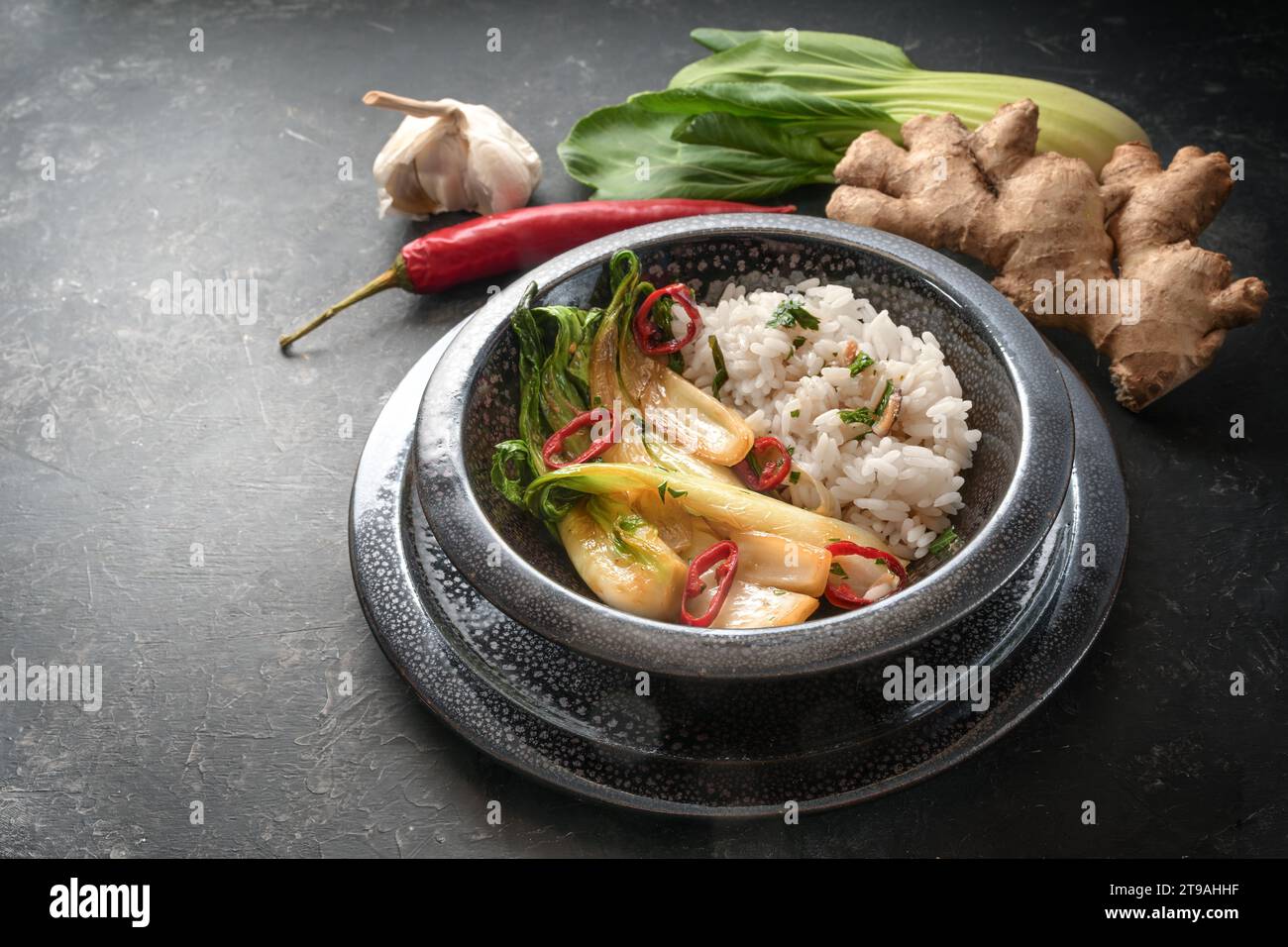 Vegetarian meal from rice ad Pak choi (Chinese cabbage) with ginger ...