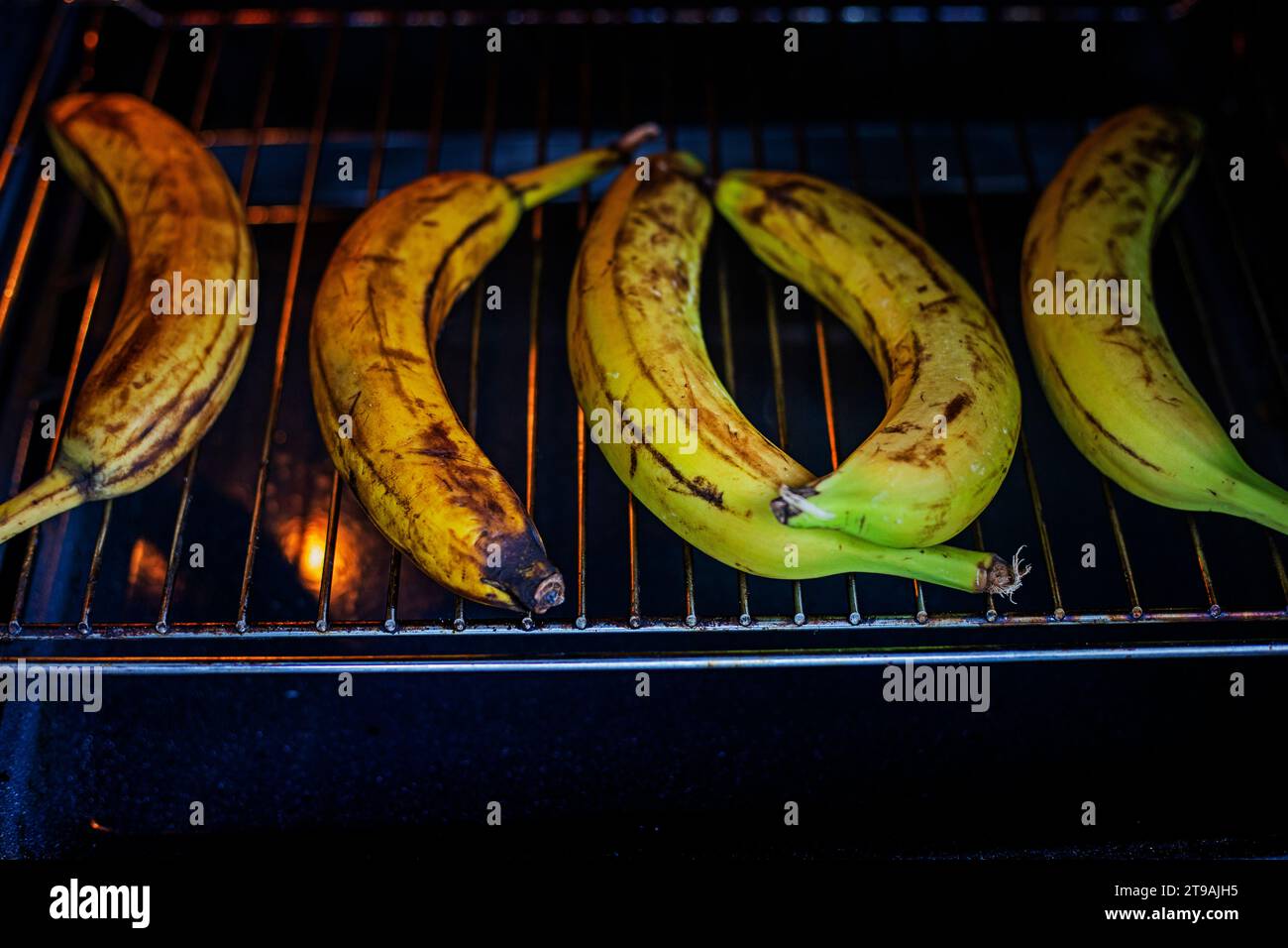 bake bananas in an electric oven Stock Photo Alamy