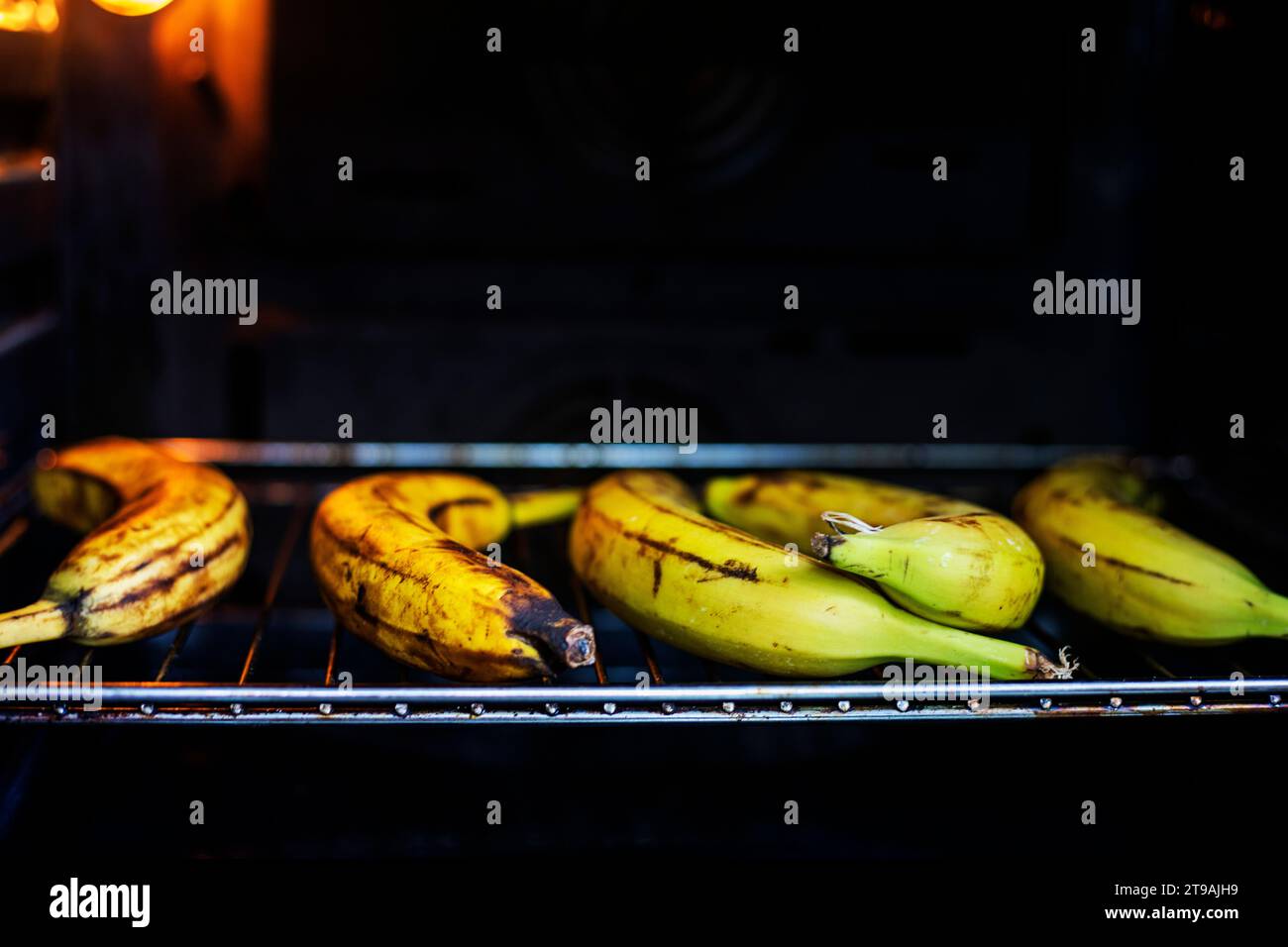 bake bananas in an electric oven Stock Photo Alamy