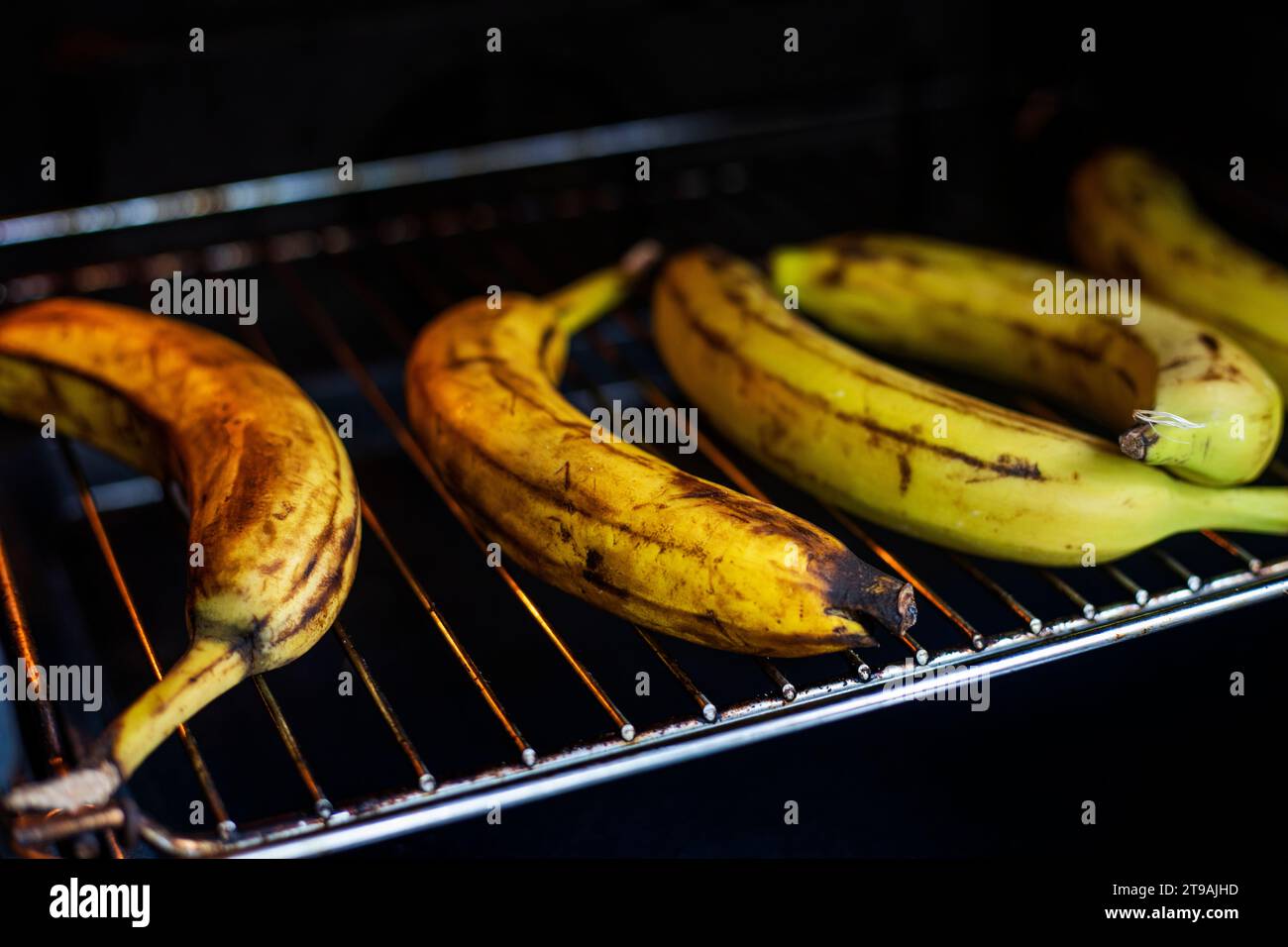 bake bananas in an electric oven Stock Photo Alamy