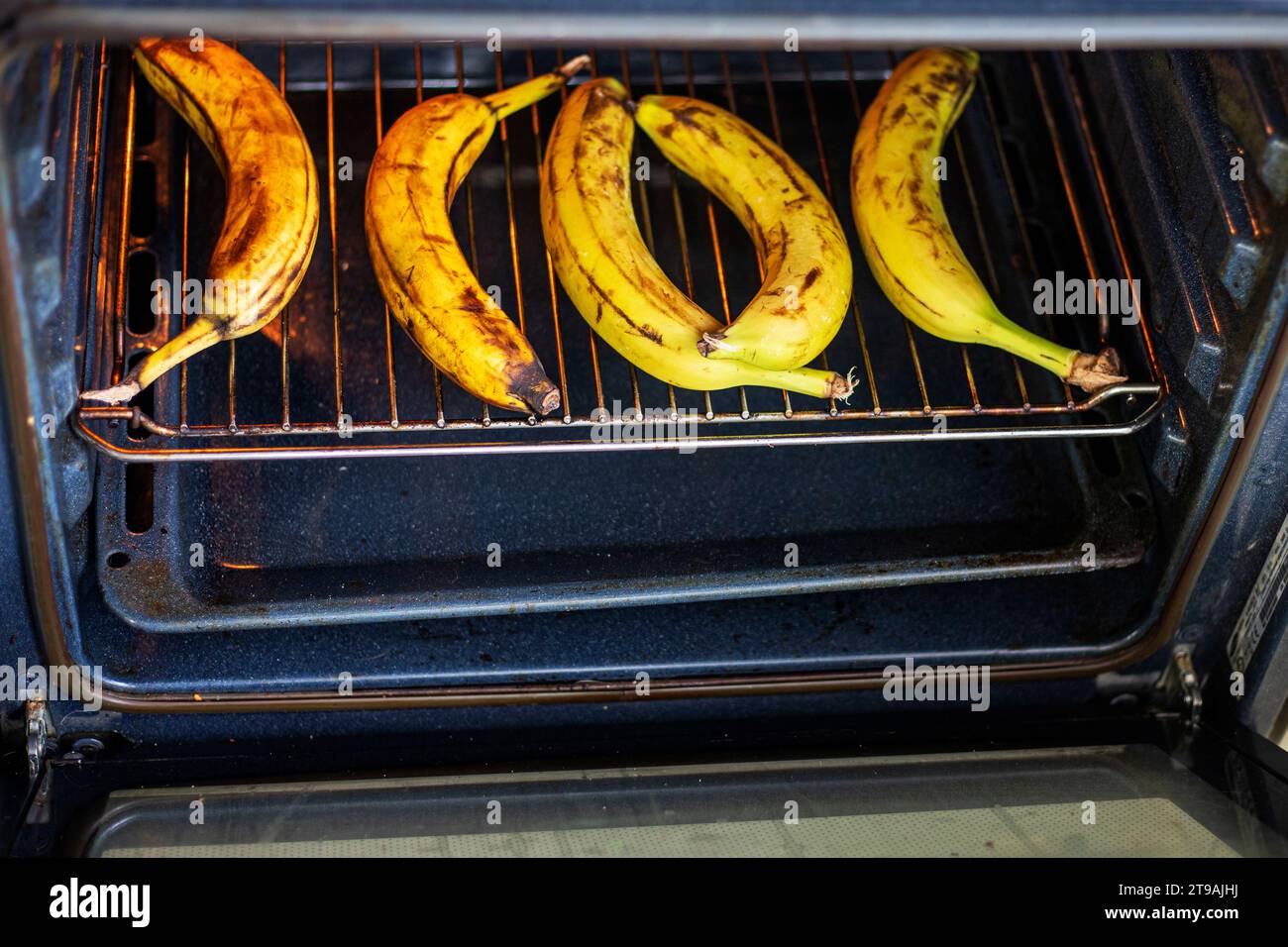 bake bananas in an electric oven Stock Photo Alamy