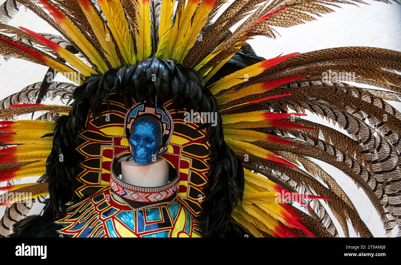 A Gorgeous traditional Aztec headdress made with shiny stones and exotic bird feathers Stock Photo
