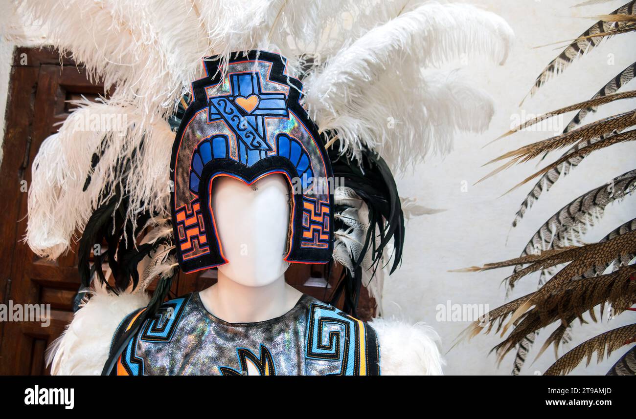 A Aztec Mexican dancer headdress with exotic bird feathers and traditional sewing decorations Stock Photo