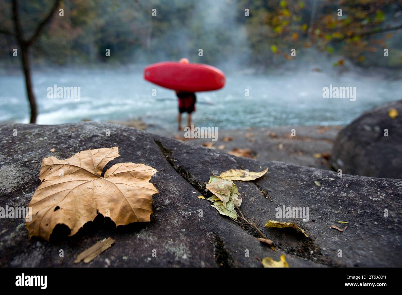 Bryan Kirk stands with his boat at the put in of the Upper Gauley river