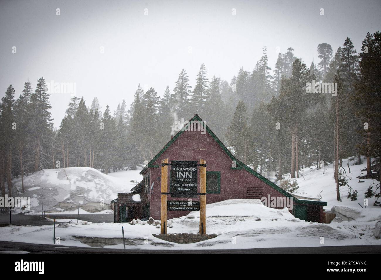 Old lodge / inn during a snow storm. Stock Photo