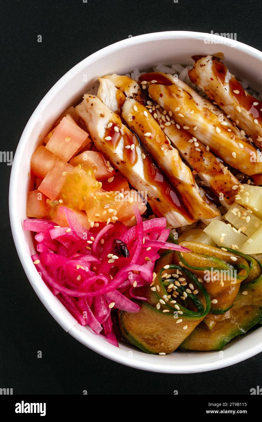 Hawaiian chicken poke bowl with rice Stock Photo Alamy