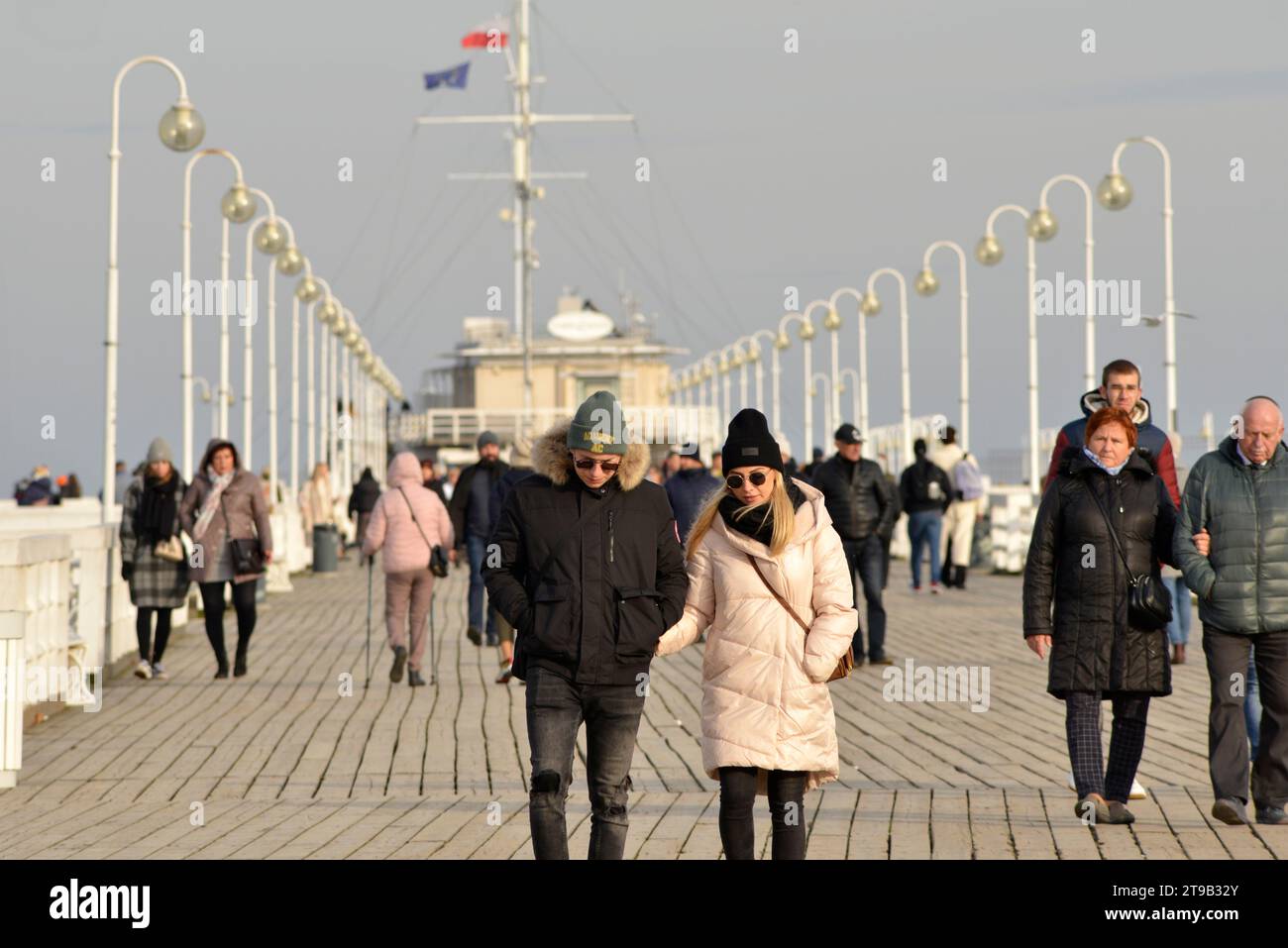 people, tourists, locals, jackets, cold weather, Winter, out of season, Sopot Pier, day out, Polish resort, Baltic Sea, town, city, Sopot, Poland Stock Photo