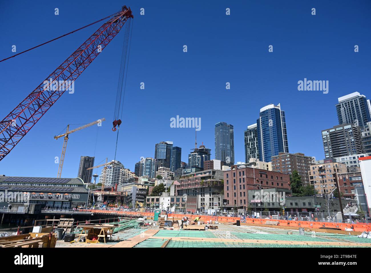 Seattle, WA, USA - August 3, 2023: The construction in Seattle. Construction crane. Stock Photo