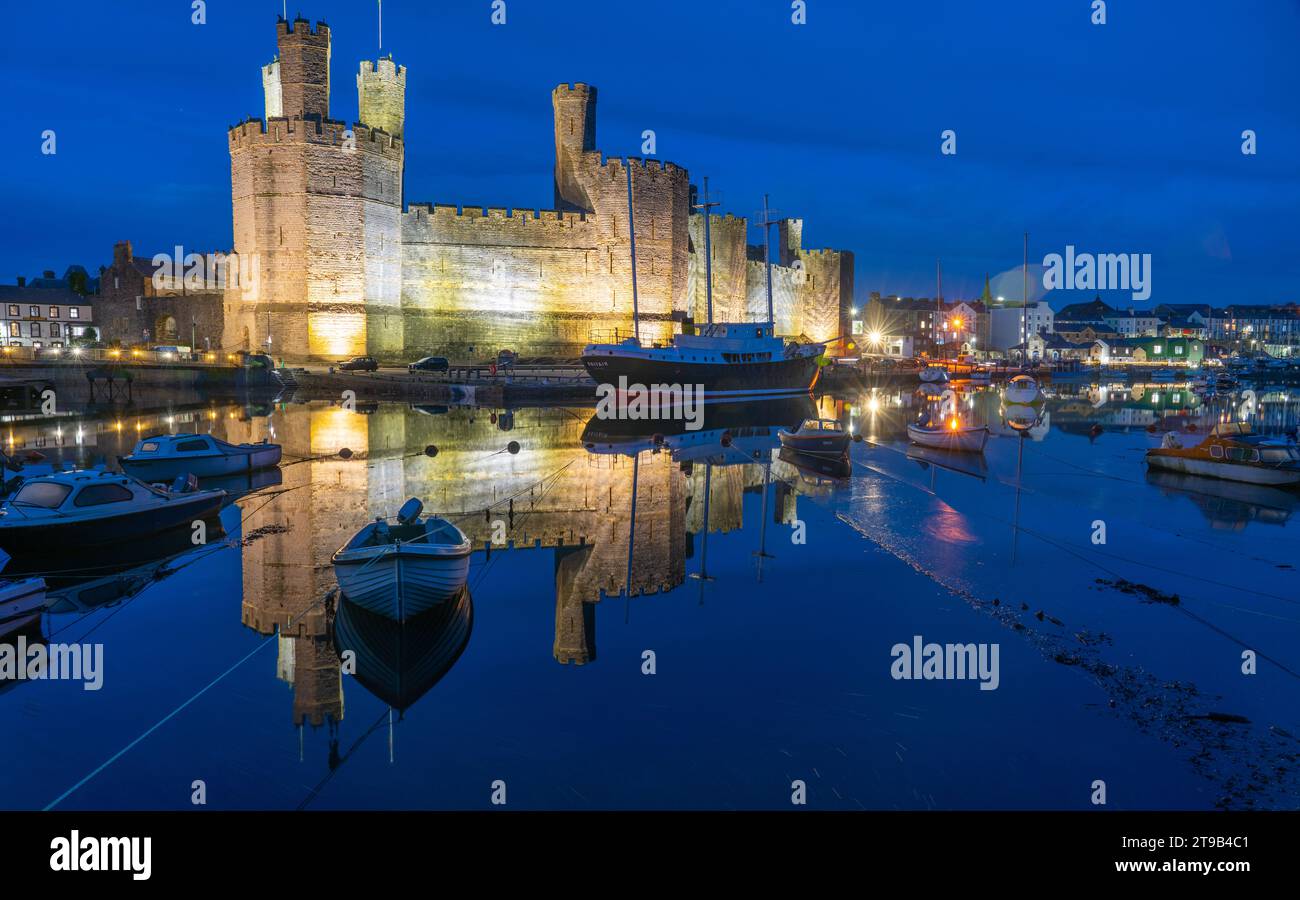 Caernarfon Castle on the river Seiont in Gwynedd, North Wales. Image taken in October 2023. Stock Photo