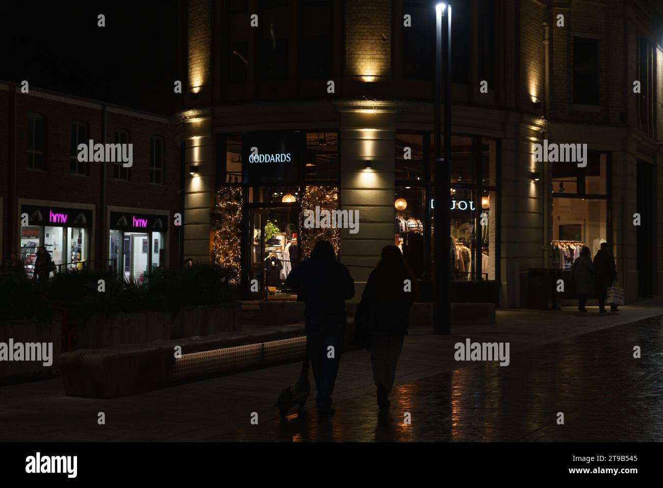 Shopping area at night, Lincoln city centre, UK.Goddards. Stock Photo