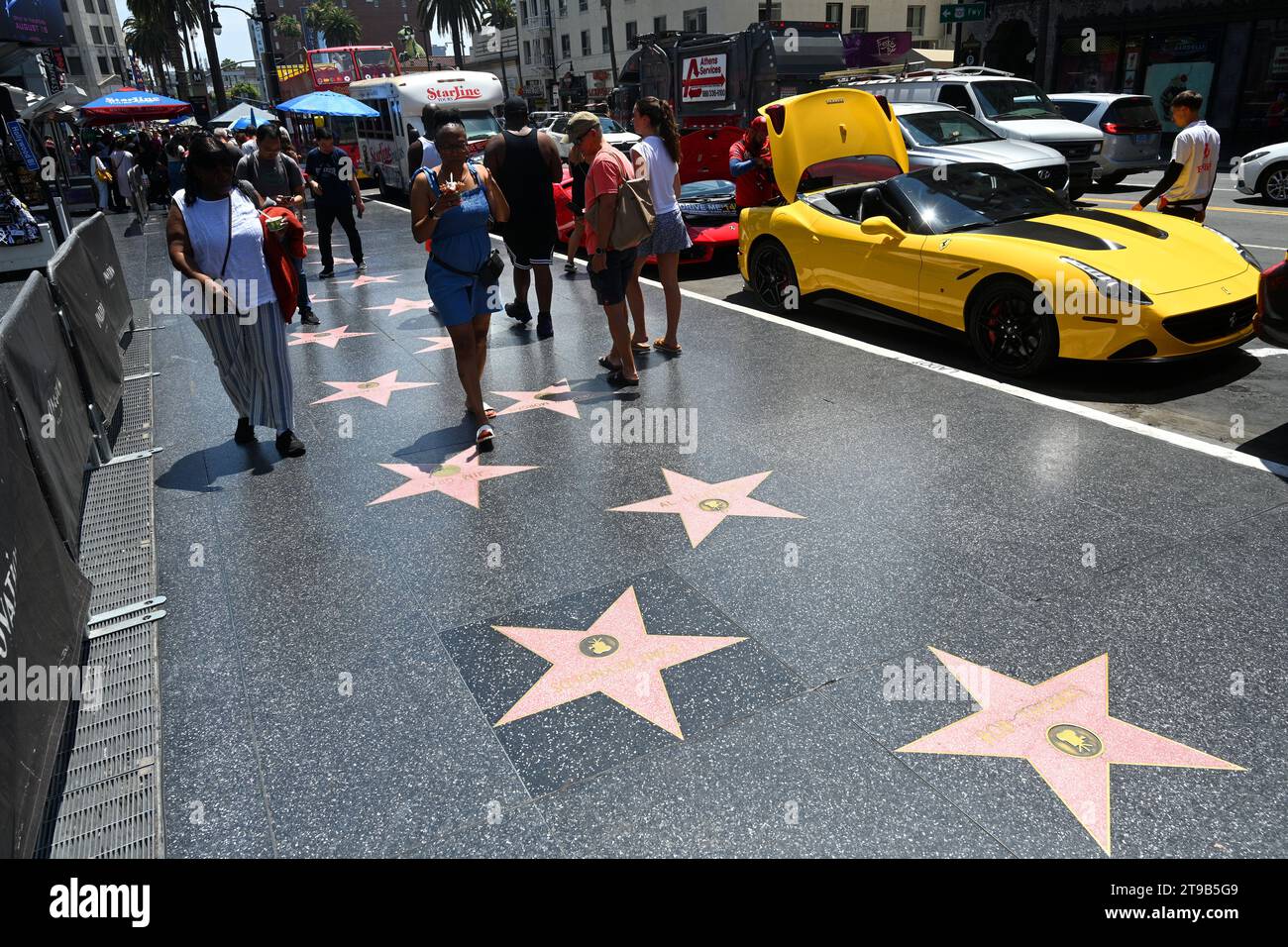 Los Angeles, California, USA - July 29, 2023: A people at the Hollywood Walk of Fame stars in Los Angeles. Stock Photo