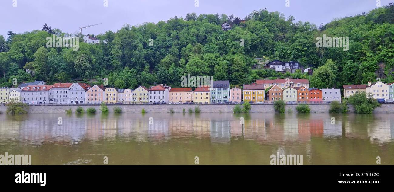 Danube River shoreline houses, Passau, Bavaria, Germany.Colorful houses in historical old town Passau, situated on the conjunction of three rivers Stock Photo
