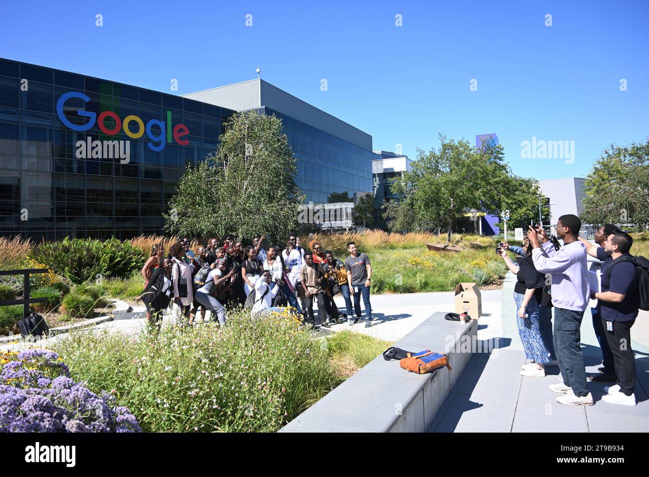Mountain View, CA, USA - July 28, 2023: People near the Googleplex  headquarters complex of Google and its parent company at 1600 Amphitheatre Parkway Stock Photo