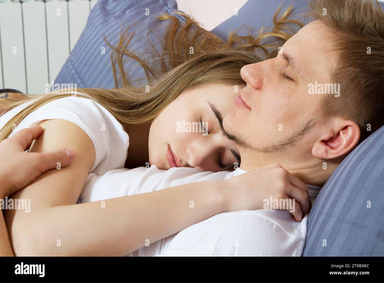 Cute Couple in Love Lying in the Bed Sleeping Together Stock Image - Image  of beauty, girlfriend: 158849333