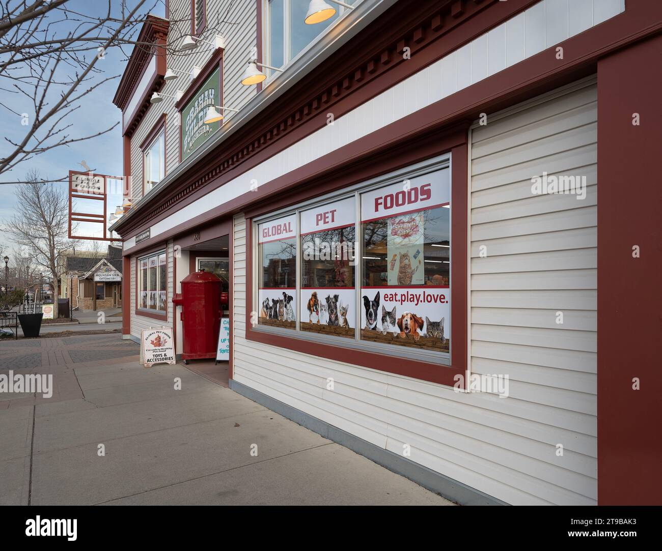 Cochrane, Alberta, Canada – November 21, 2023:  Exterior of the Global Pet Foods Store in the downtown district Stock Photo