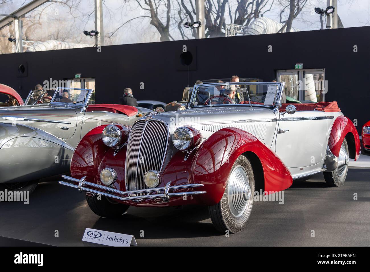 Paris, France - RM Sotheby's Paris 2020. Focus on a red and silver 1946 Delahaye 135 Cabriolet by Figoni et Falaschi. Chassis no. 800308. Stock Photo