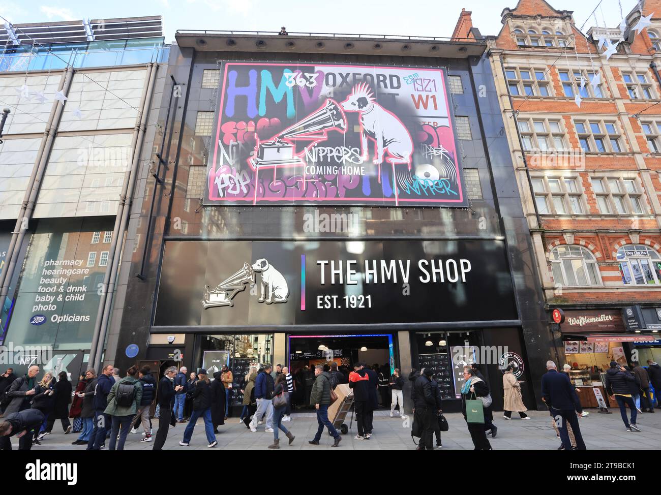London, UK 24th November 2023. HMV has reopened it's iconic flagship store on London, Oxford Street after a 4 year absence. The pop band Madness opened the shop this morning and fans who had been queueing rushed in. Credit : Monica Wells/Alamy Live News Stock Photo