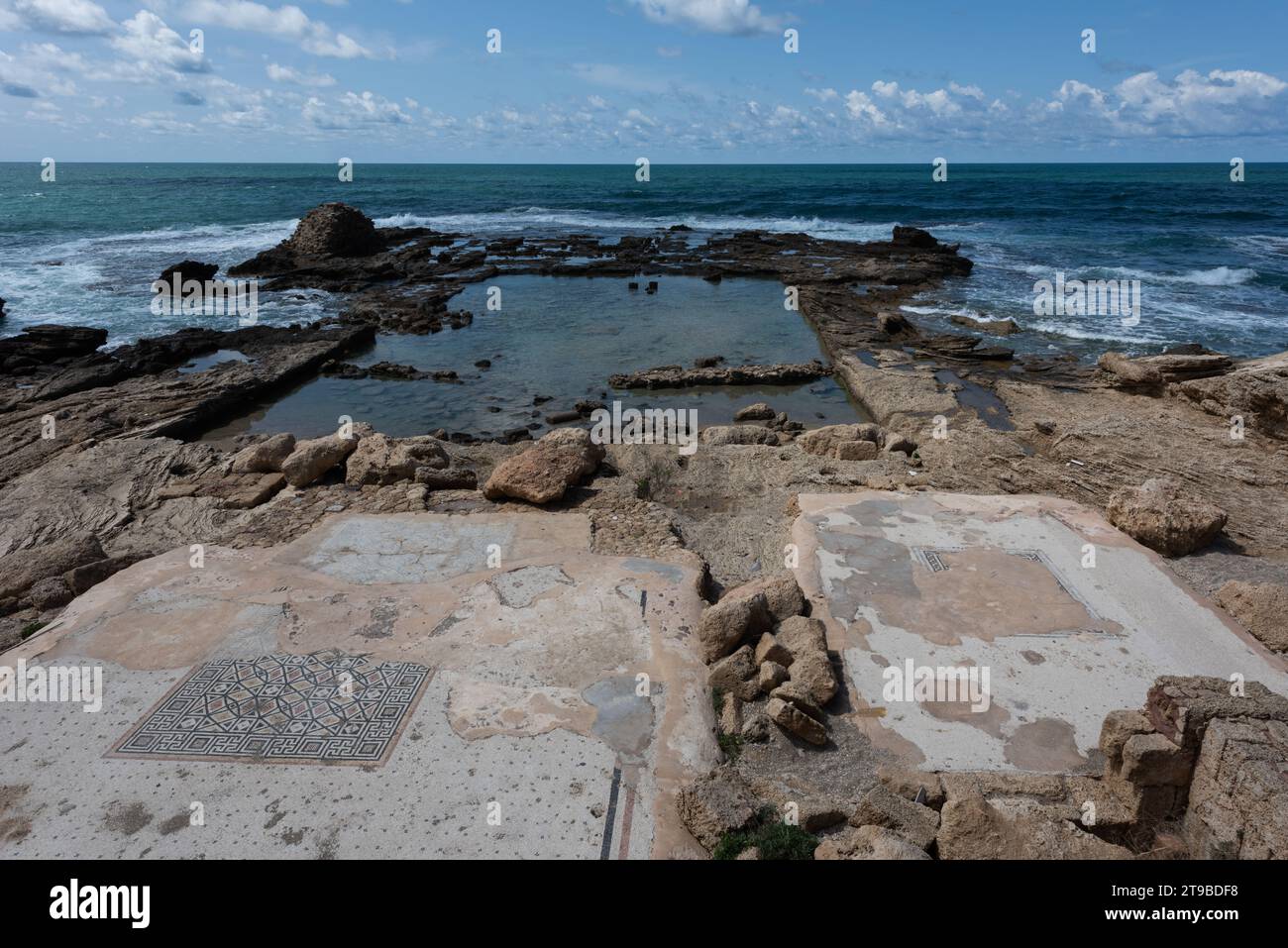 The Mediterranean coast, beach and harbor of  Caesarea Maritima National Park, Caesarea, Israel Stock Photo