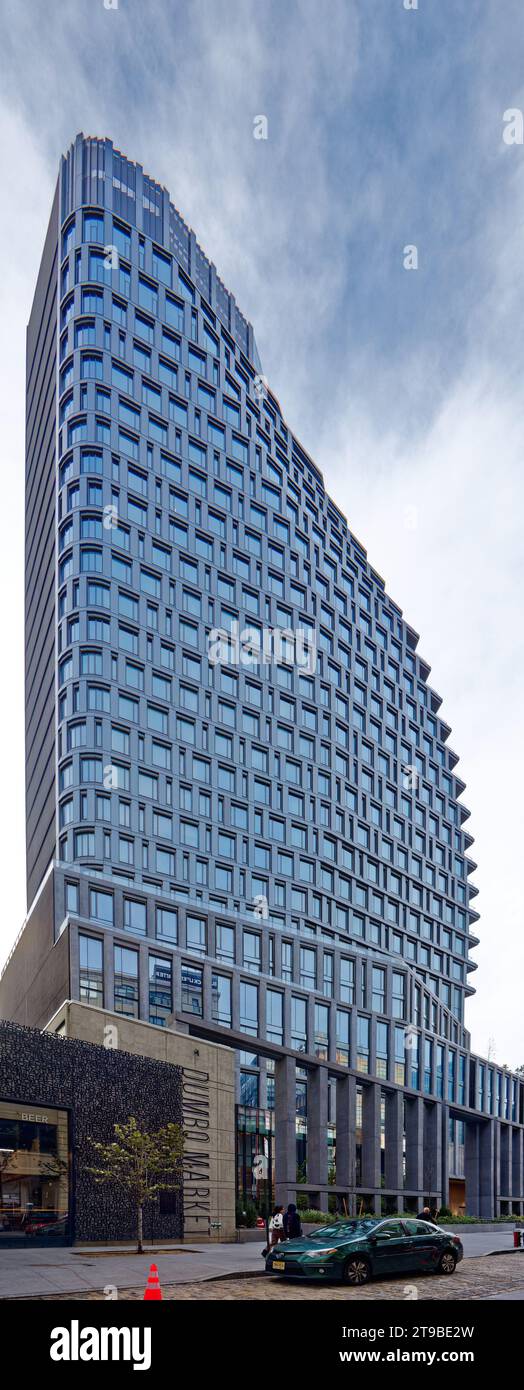 Olympia DUMBO is a 33-story sail-shaped glass and steel mixed-use condo at 30 Front Street, adjacent to the Brooklyn Bridge anchorage. Stock Photo