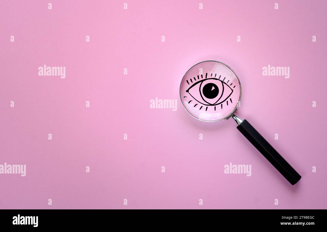 business concept, looking ahead,innovation,solution idea,human resources,magnifying glass with human eye sketch as symbol for good planning and a succ Stock Photo