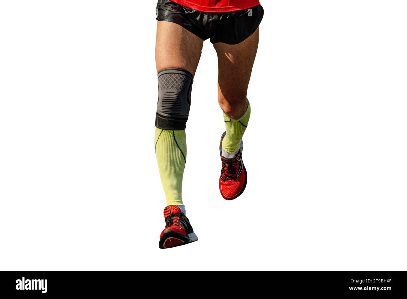 closeup legs male runner in compression socks and knee pads running