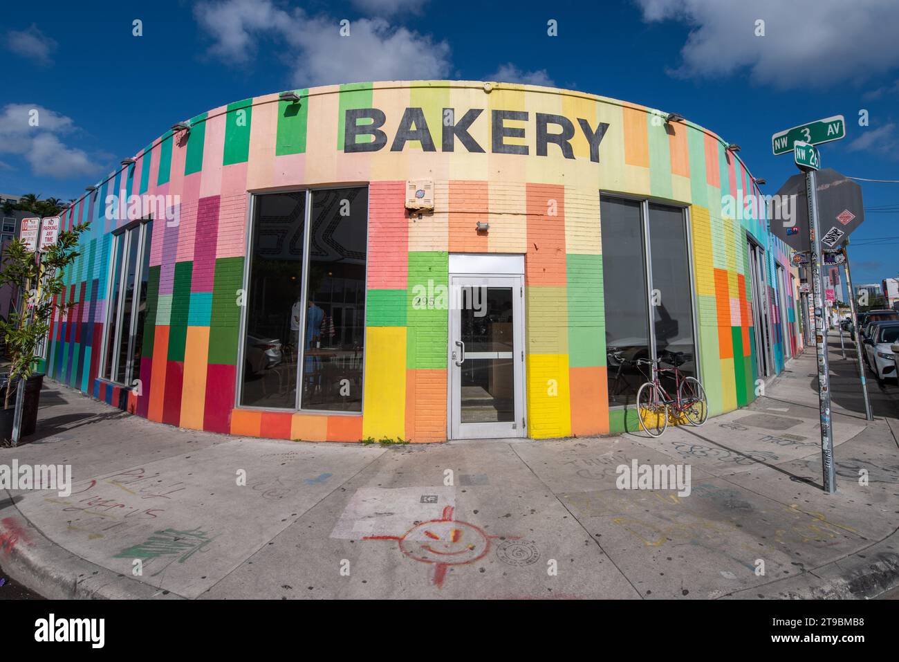 Miami, FL—Nov 20, 2023; Zak the Baker, bakery business painted in bright colors in Wynwood art district known for street, pop and graffiti art downtow Stock Photo