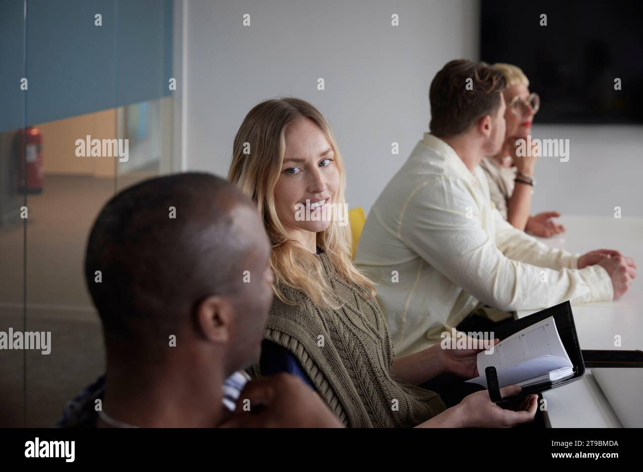 Diverse team having work meeting hi-res stock photography and images ...