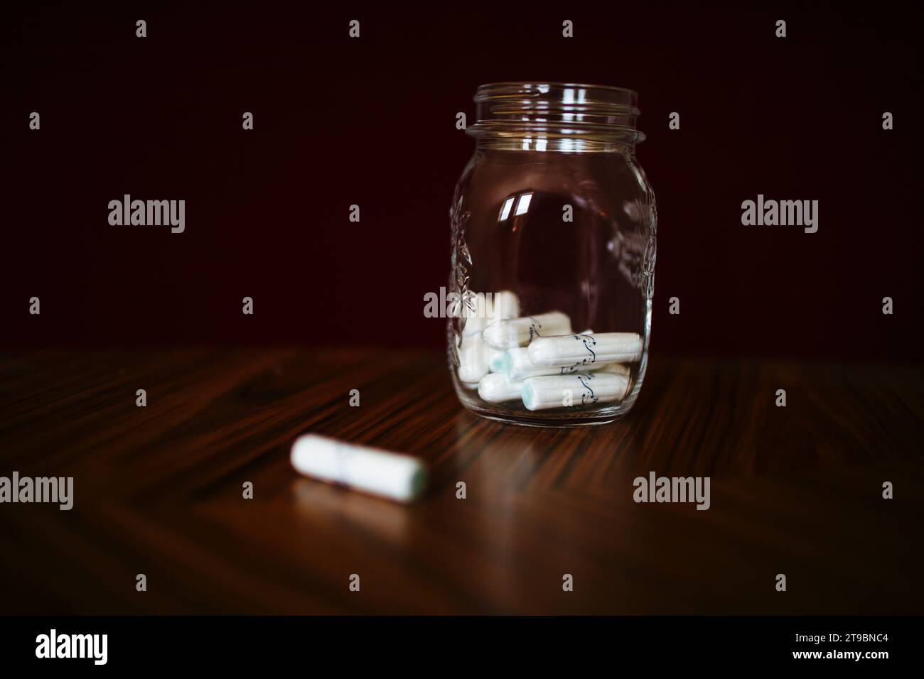 Group of tampons in glass jar Stock Photo