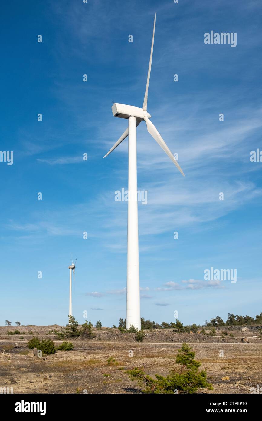 Wind turbine against blue sky Stock Photo - Alamy