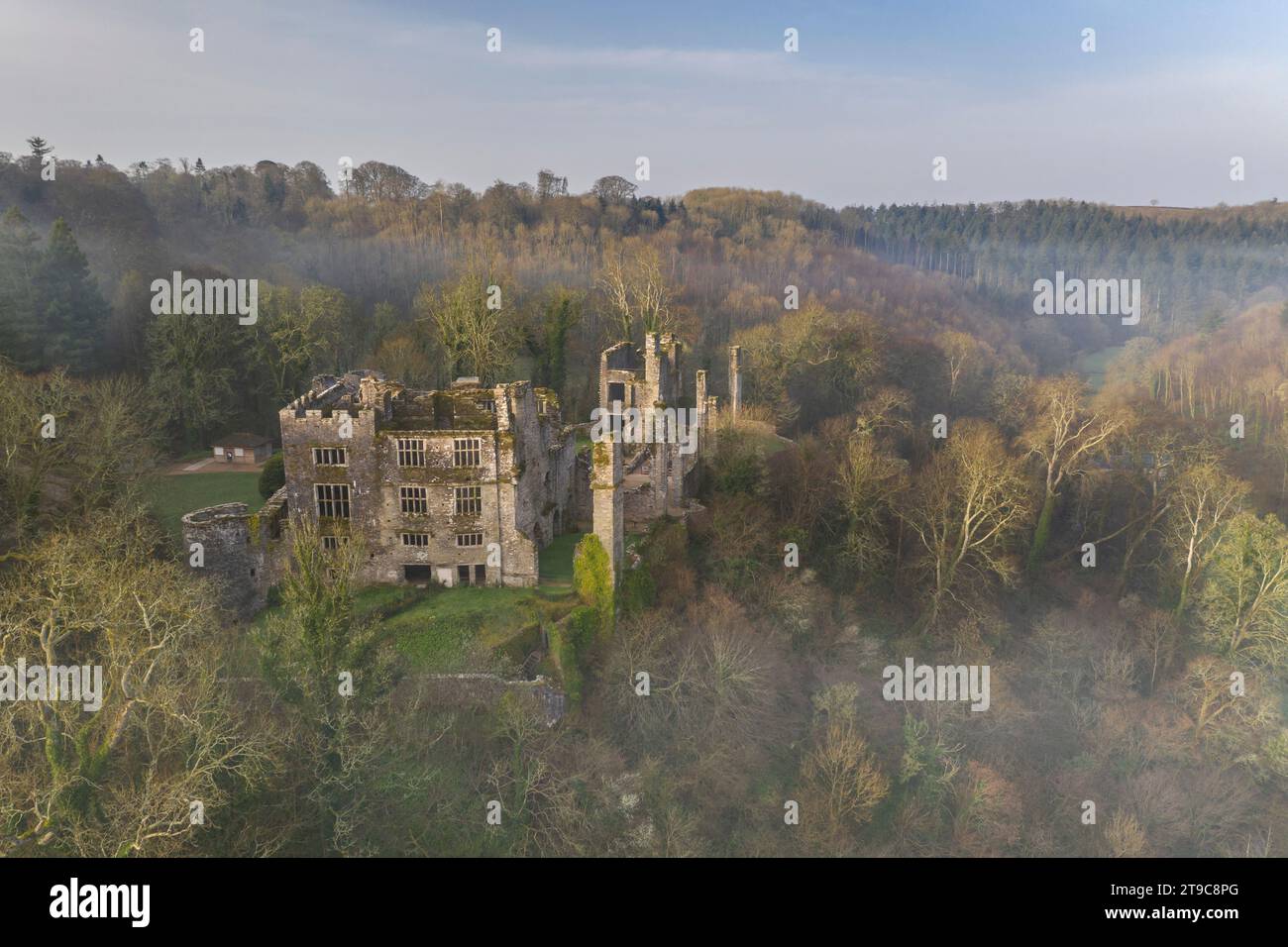 Aerial vista of the ruins of Berry Pomeroy Castle at dawn, South Hams, Devon, England. Spring (March) 2021. Stock Photo