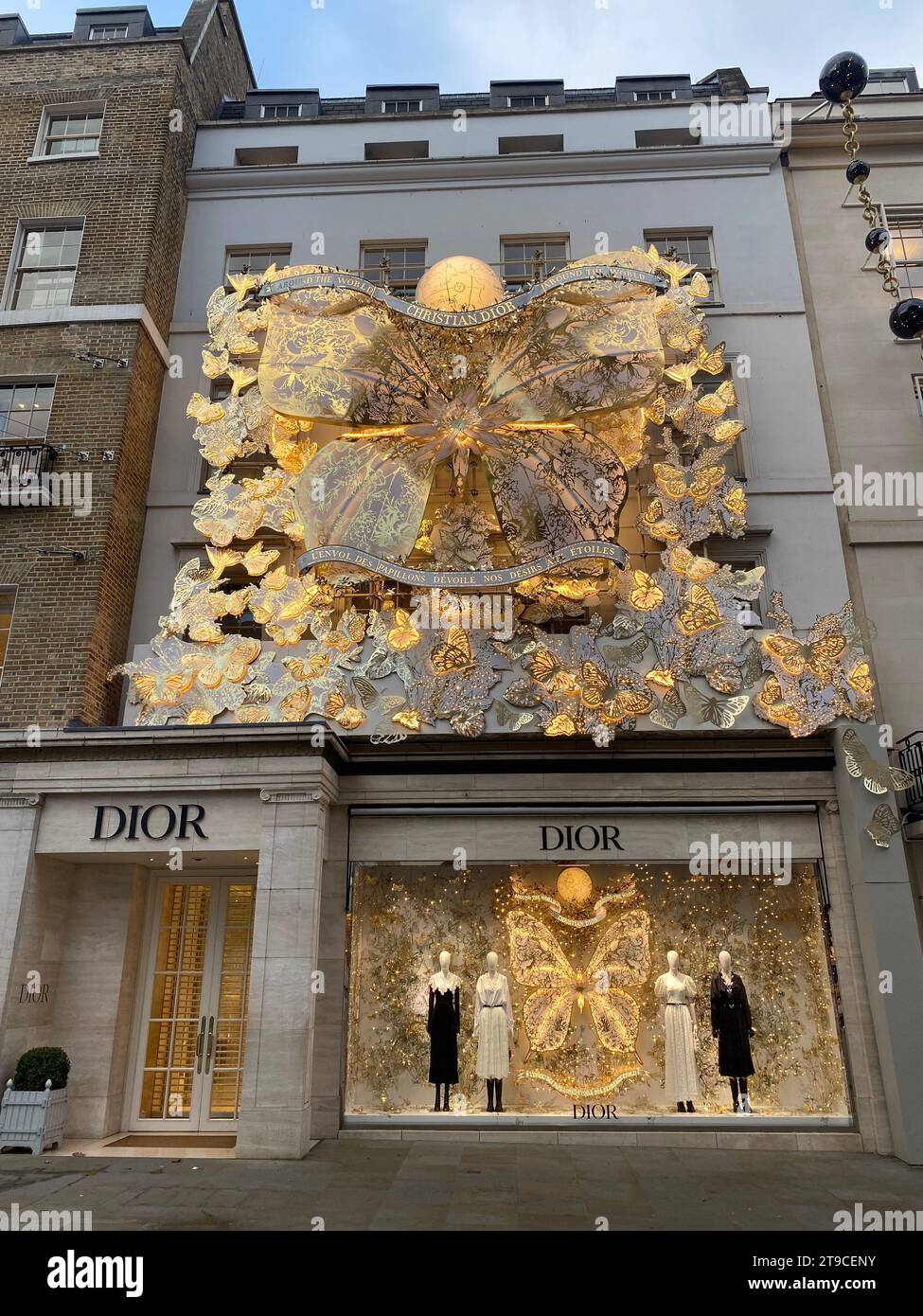 Outside the brand's flagship store stands a five meter Nordmann Fir tree decorated with hand painted bear baubles .Visitors are welcome to donate to The Royal Marsden Cancer Charity and dedicate a personalised star to be featured on the Ralph Lauren Giving Tree .. Stock Photo
