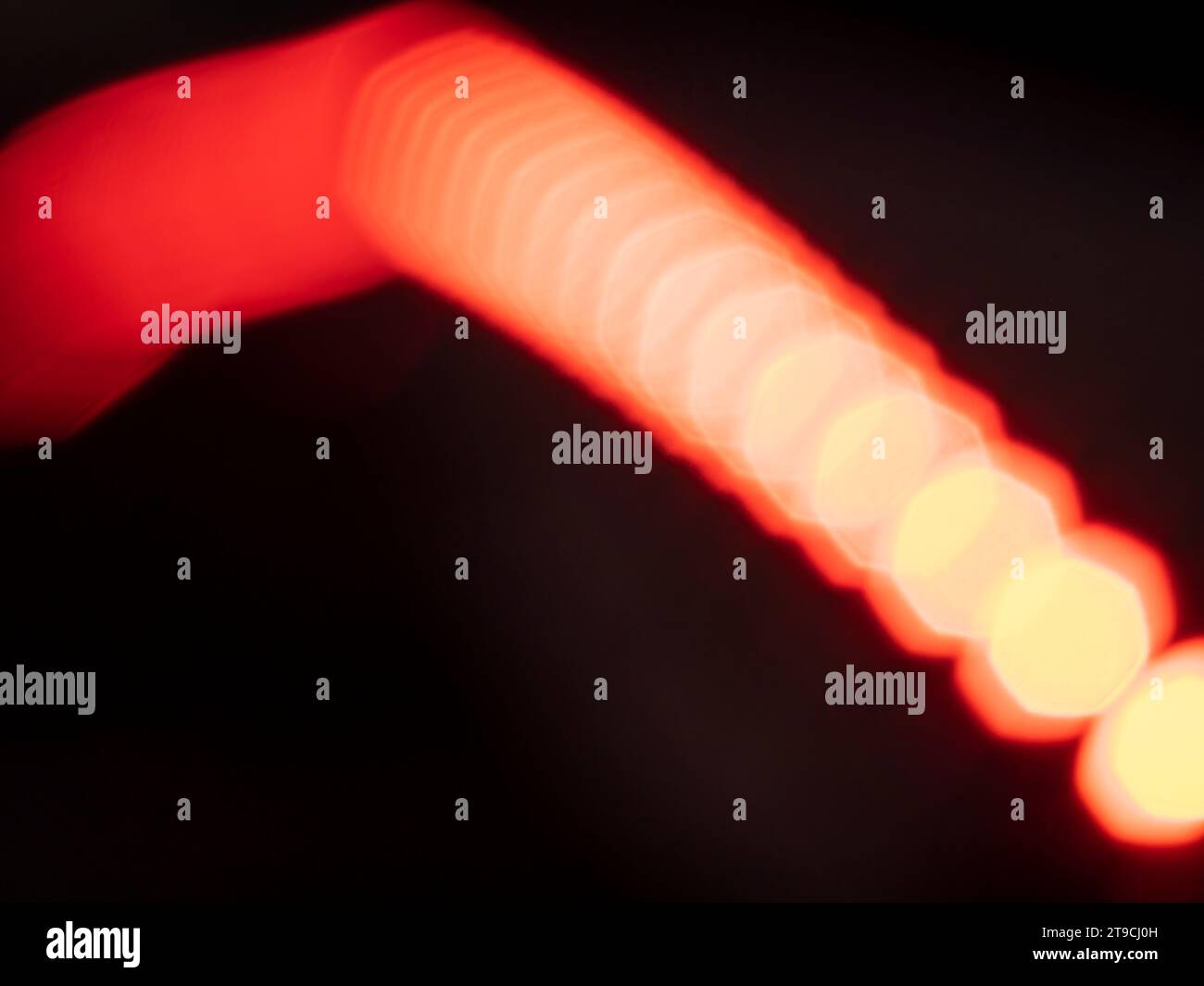 Abstract background with bokeh defocused lights on black background. Stock Photo