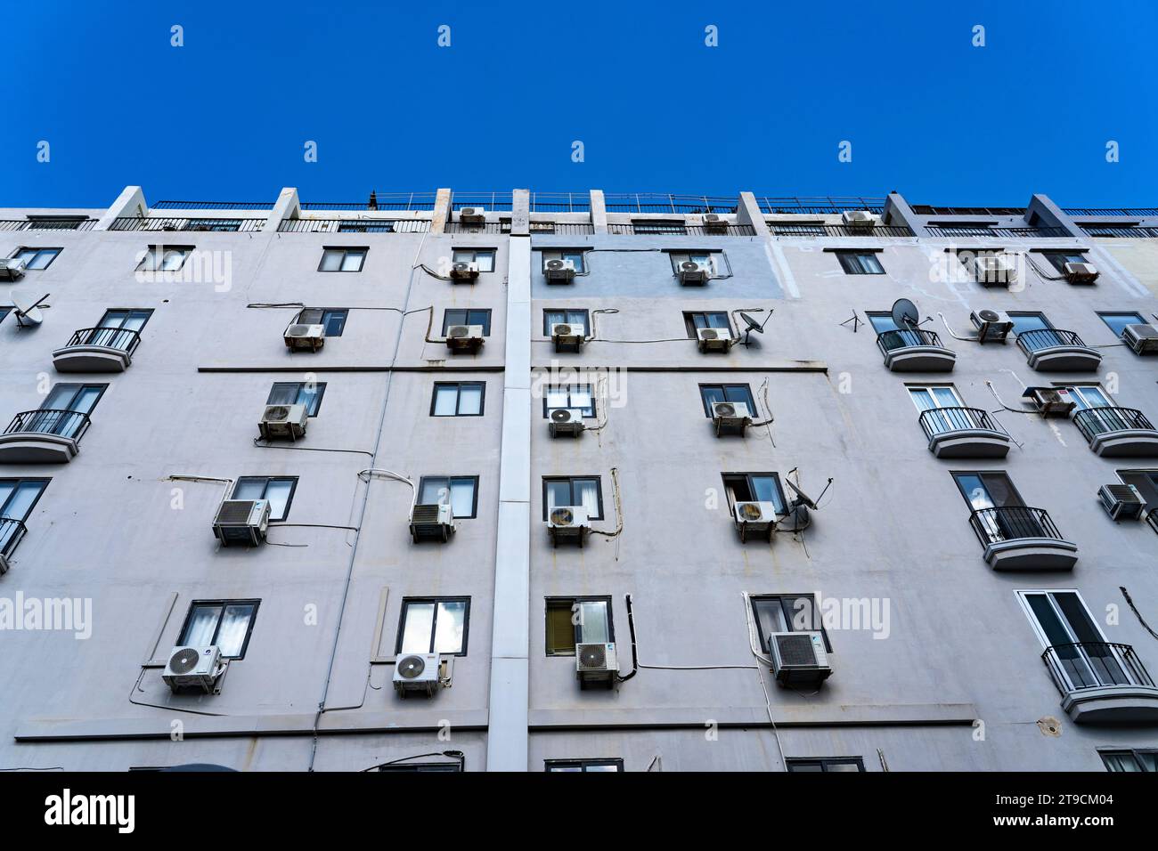 Air conditioning systems on apartment building in Spinola Bay, Saint
