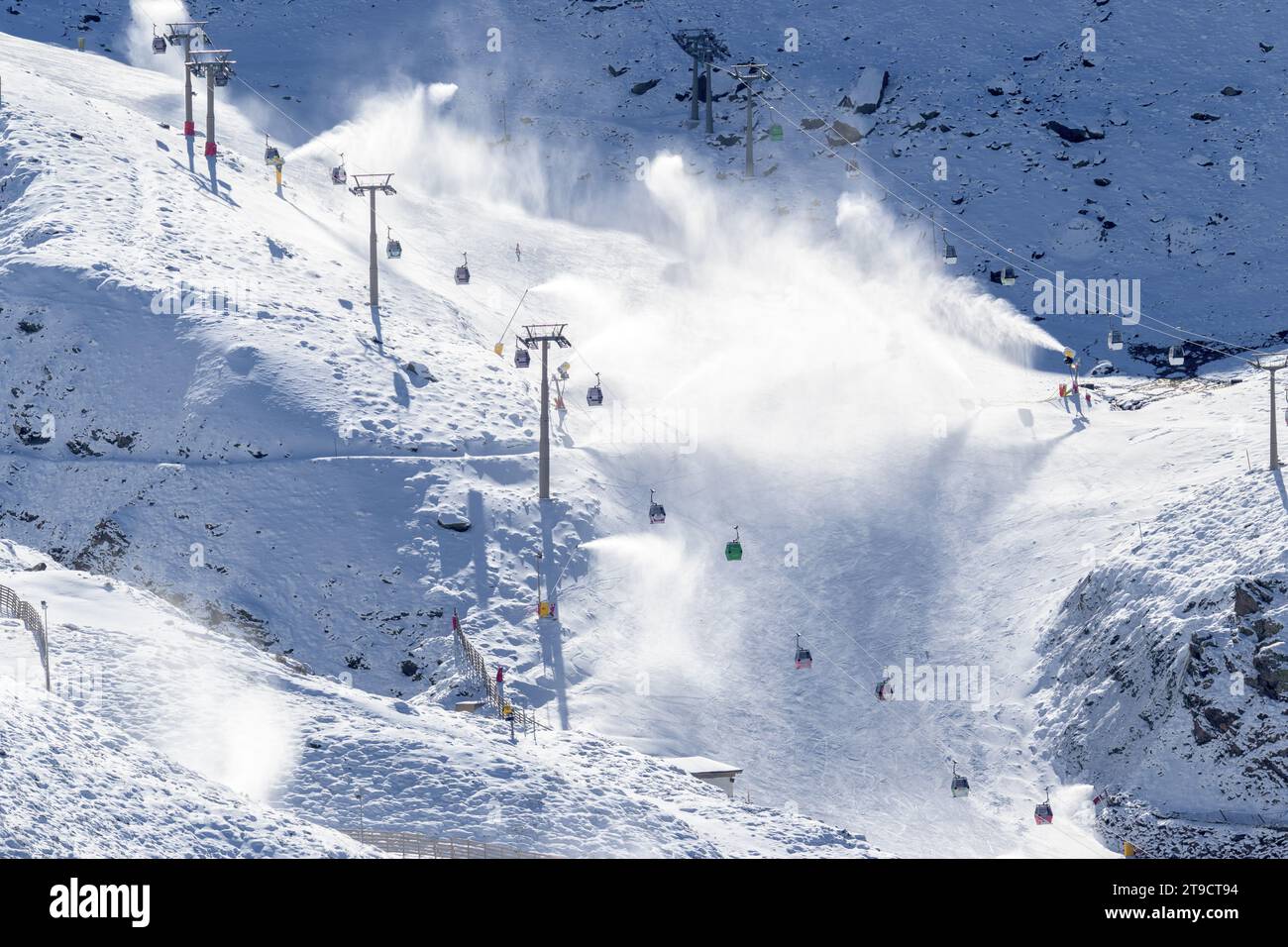 ski resort artificial snow slopes using snow cannons, Stock Photo