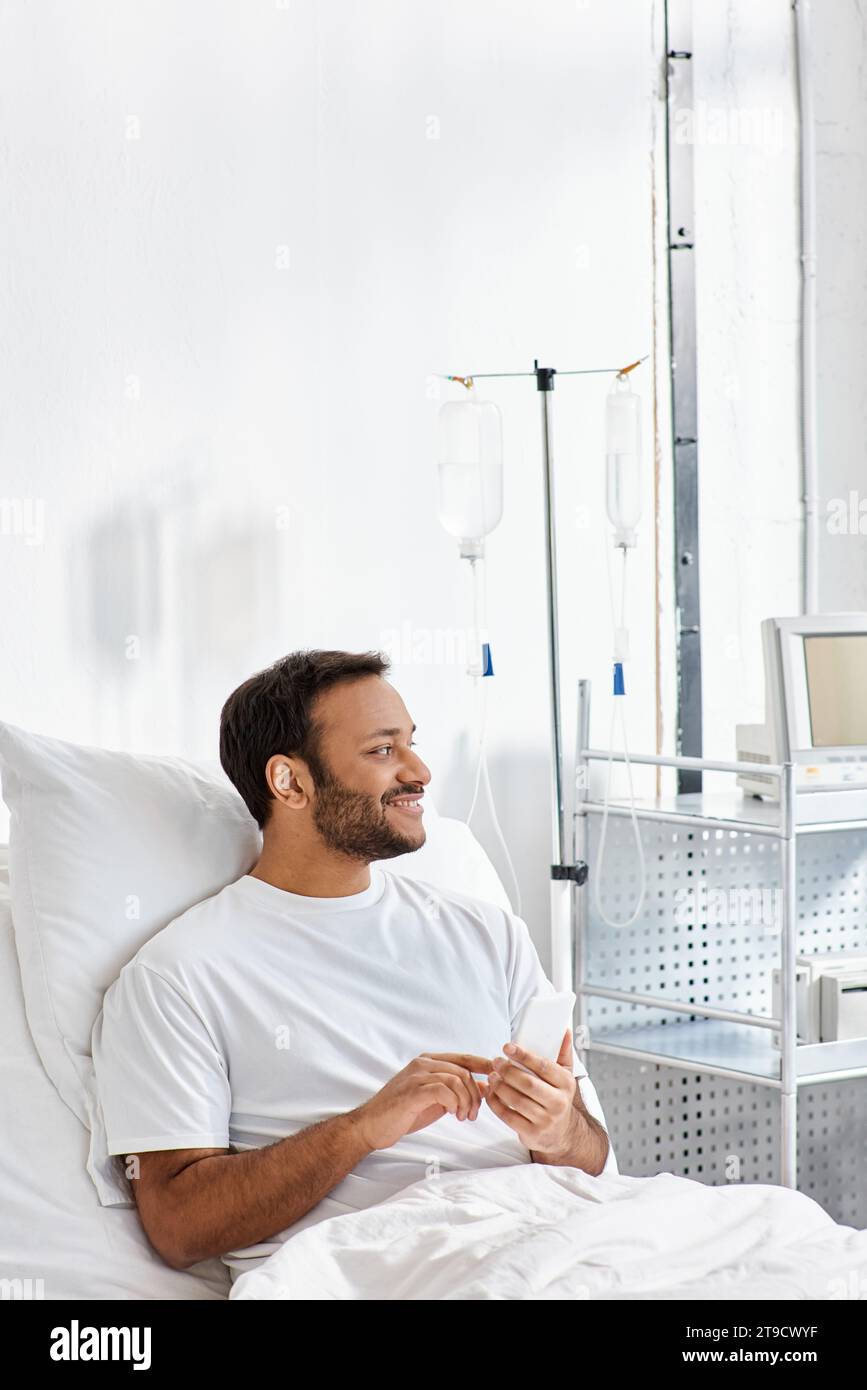 Man lying in hospital bed hi-res stock photography and images - Alamy
