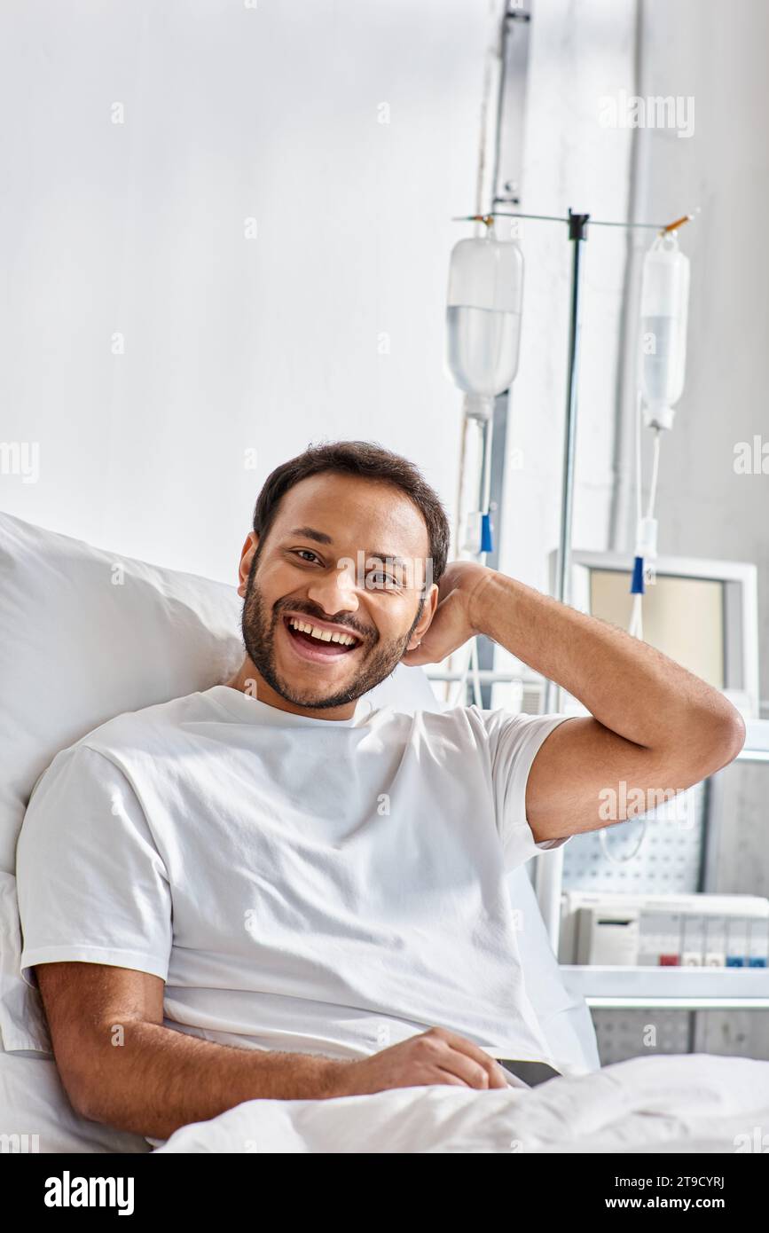 Man lying in hospital bed hi-res stock photography and images - Alamy