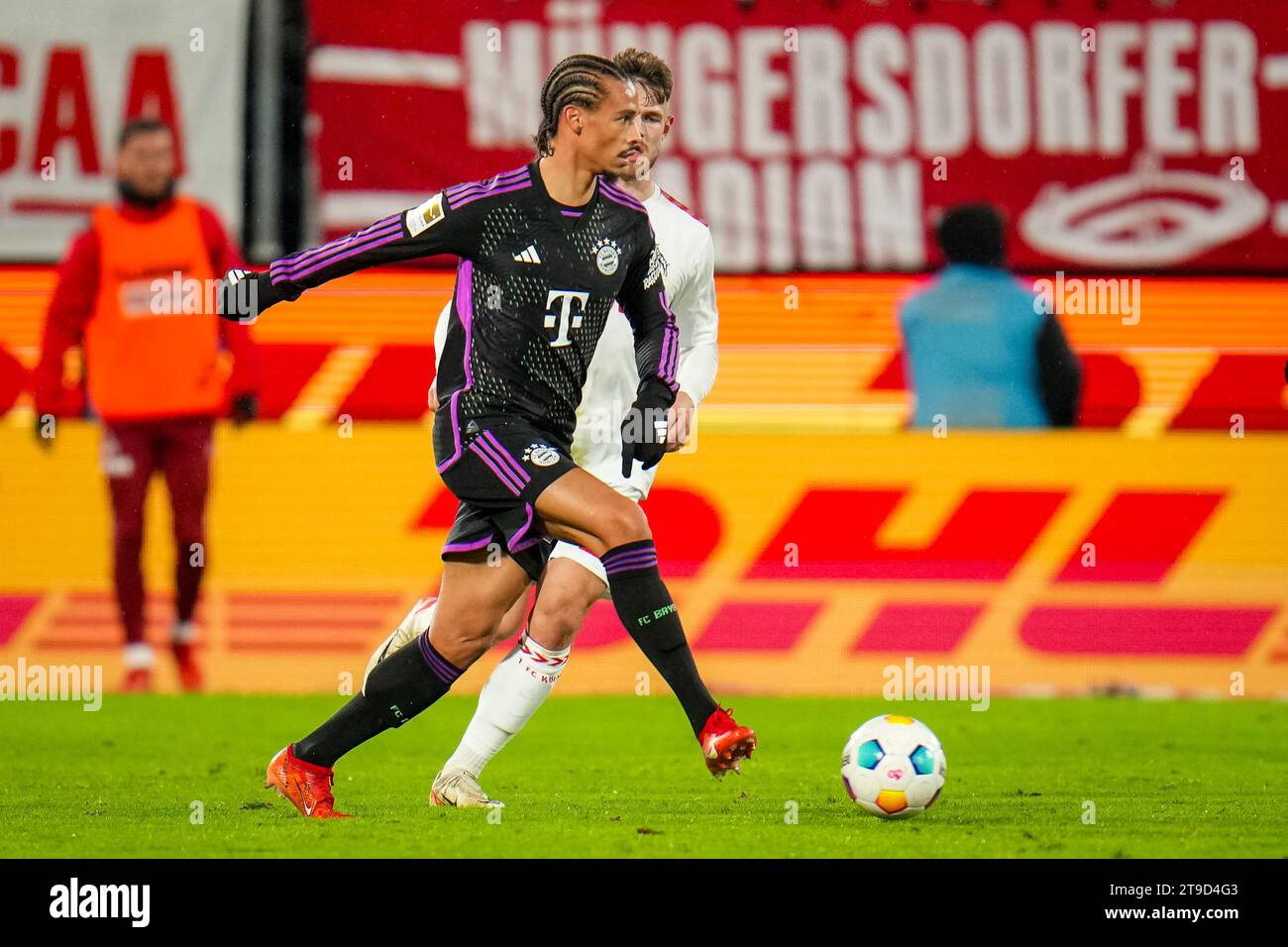 Cologne, Germany. 24th Nov, 2023. COLOGNE, GERMANY - NOVEMBER 24: Leroy Sane of FC Bayern Munchen passes the ball during the Bundesliga match between 1. FC Koln and FC Bayern Munchen at the RheinEnergieStadion on November 24, 2023 in Cologne, Germany. (Photo by Rene Nijhuis/BSR Agency) Credit: BSR Agency/Alamy Live News Stock Photo