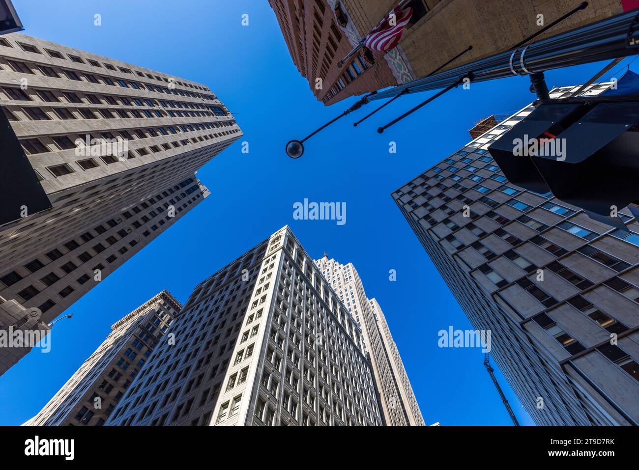 View through the urban canyons into the Detroit sky. Looking vertically upwards at a Detroit intersection. Detroit, United States Stock Photo