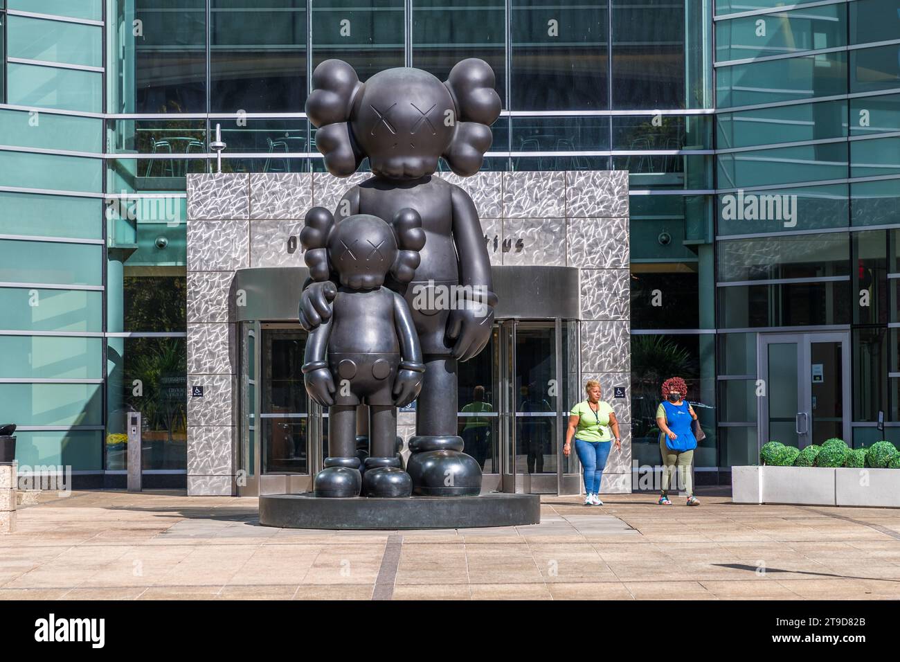 Statue “Waiting” by KAWS in Detroit, United States Stock Photo Alamy