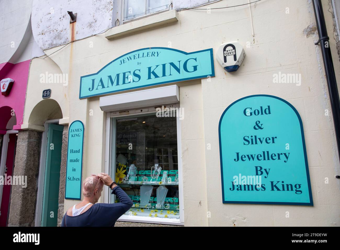St Ives town centre,James King jewellery store, model released woman window shopping,Cornwall,England,UK,2023 Stock Photo