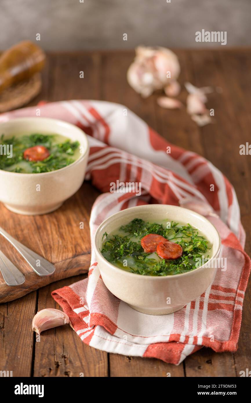 https://c8.alamy.com/comp/2T9DM53/caldo-verde-popular-soup-in-portuguese-cuisine-traditional-ingredients-for-caldo-verde-are-potatoes-collard-greens-olive-oil-and-salt-additionall-2T9DM53.jpg