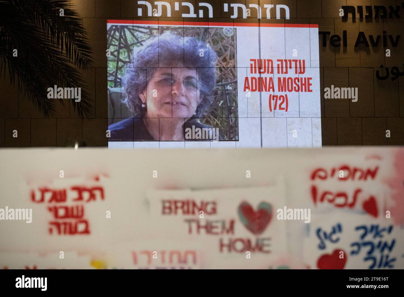 Tel Aviv, Israel. 24th Nov, 2023. A picture of a member of the first group of 13 hostages released from the Gaza Strip is projected on a building in Tel Aviv, Israel, Nov. 24, 2023. Israel's Shin Bet internal security agency has received the first group of 13 hostages released from the Gaza Strip on Friday, local media reported. Credit: Chen Junqing/Xinhua/Alamy Live News Stock Photo