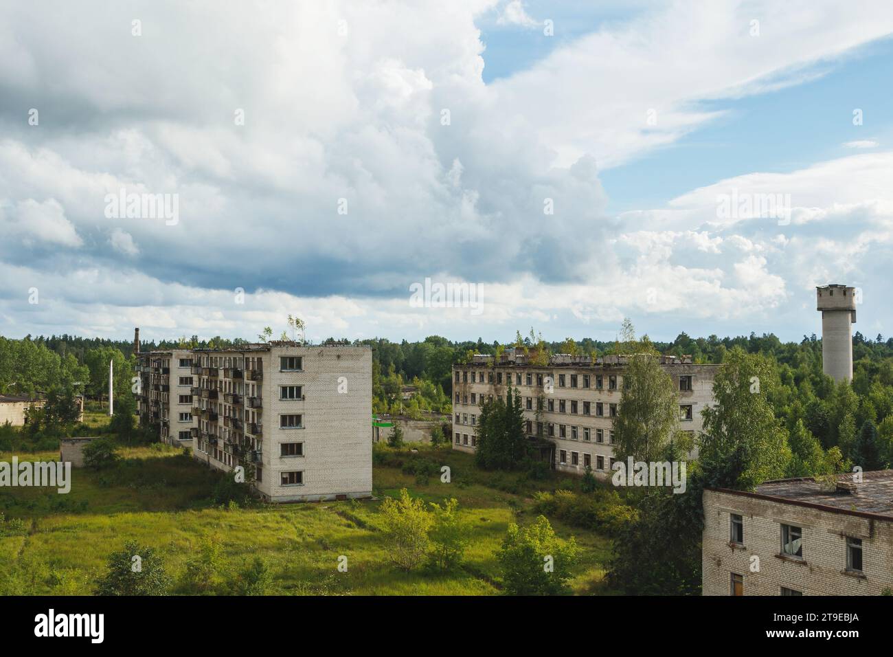 Exterior of an abandoned apartment buildings with broken windows in a ...