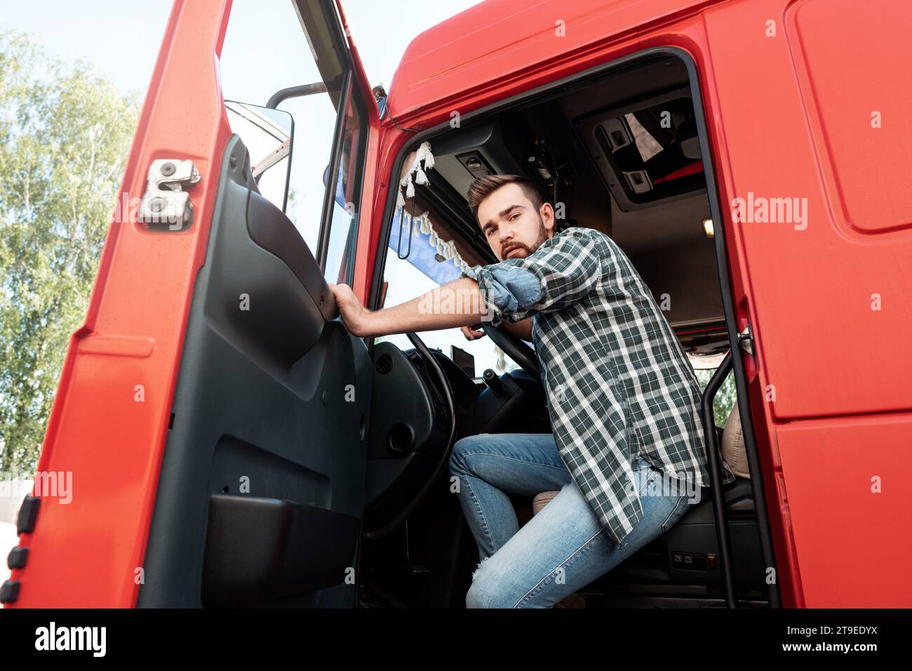 Handsome bearded driver sitting hi-res stock photography and images - Alamy