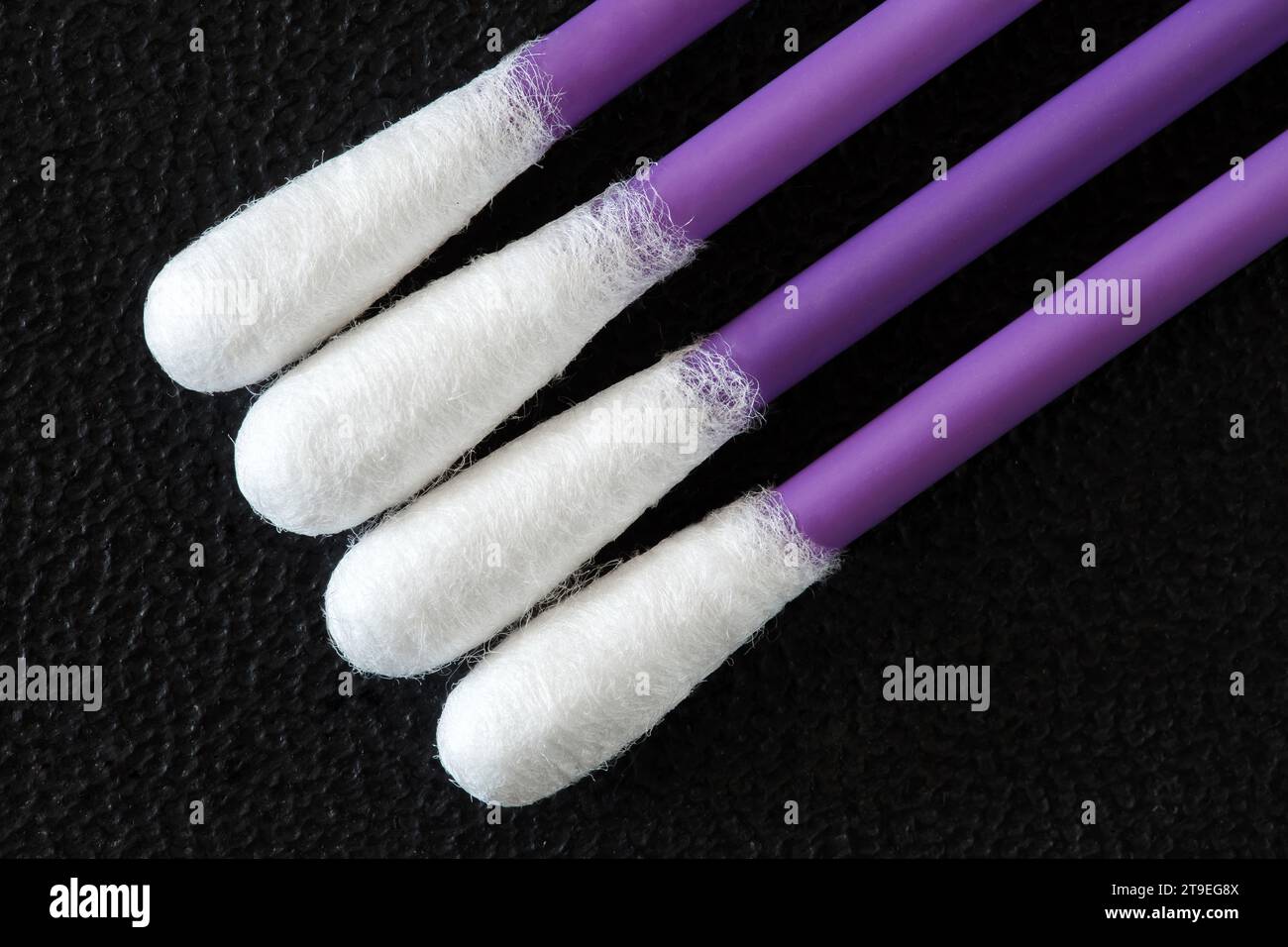 Cotton ear sticks four pieces, close-up macro view Stock Photo